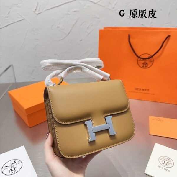 Hermès Constance Swift cowhide leather Earthy yellow size: 19cm